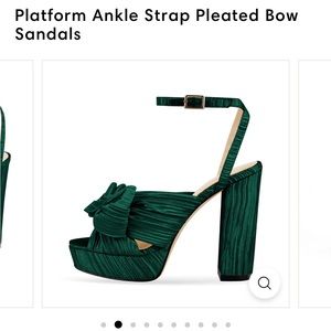 Brand new still in box never worn! Green with a bow